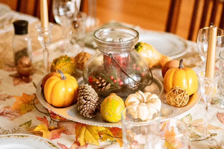 DIY harvest decorations for Thanksgiving on the dining table.