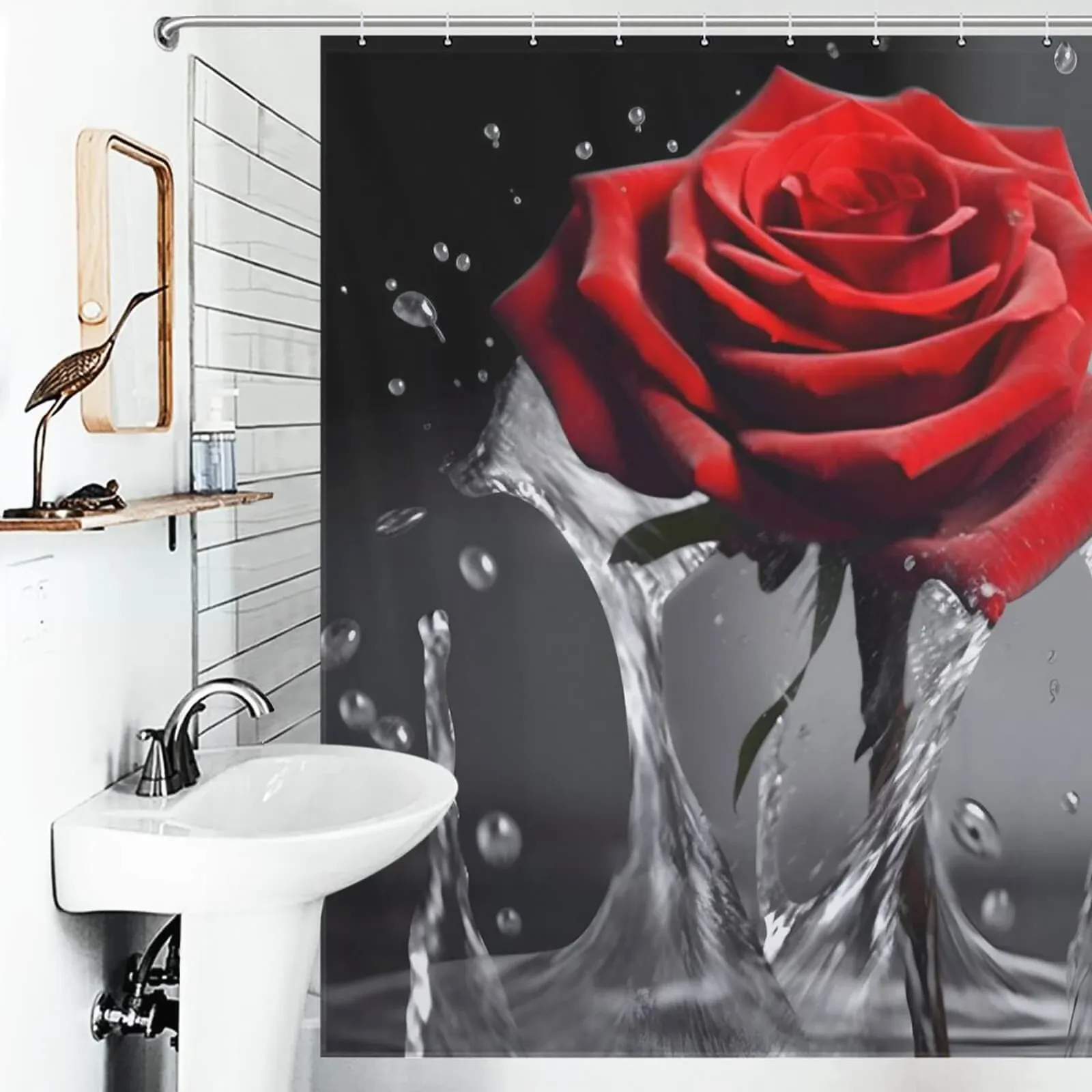 A shower curtain with a red rose in the water.