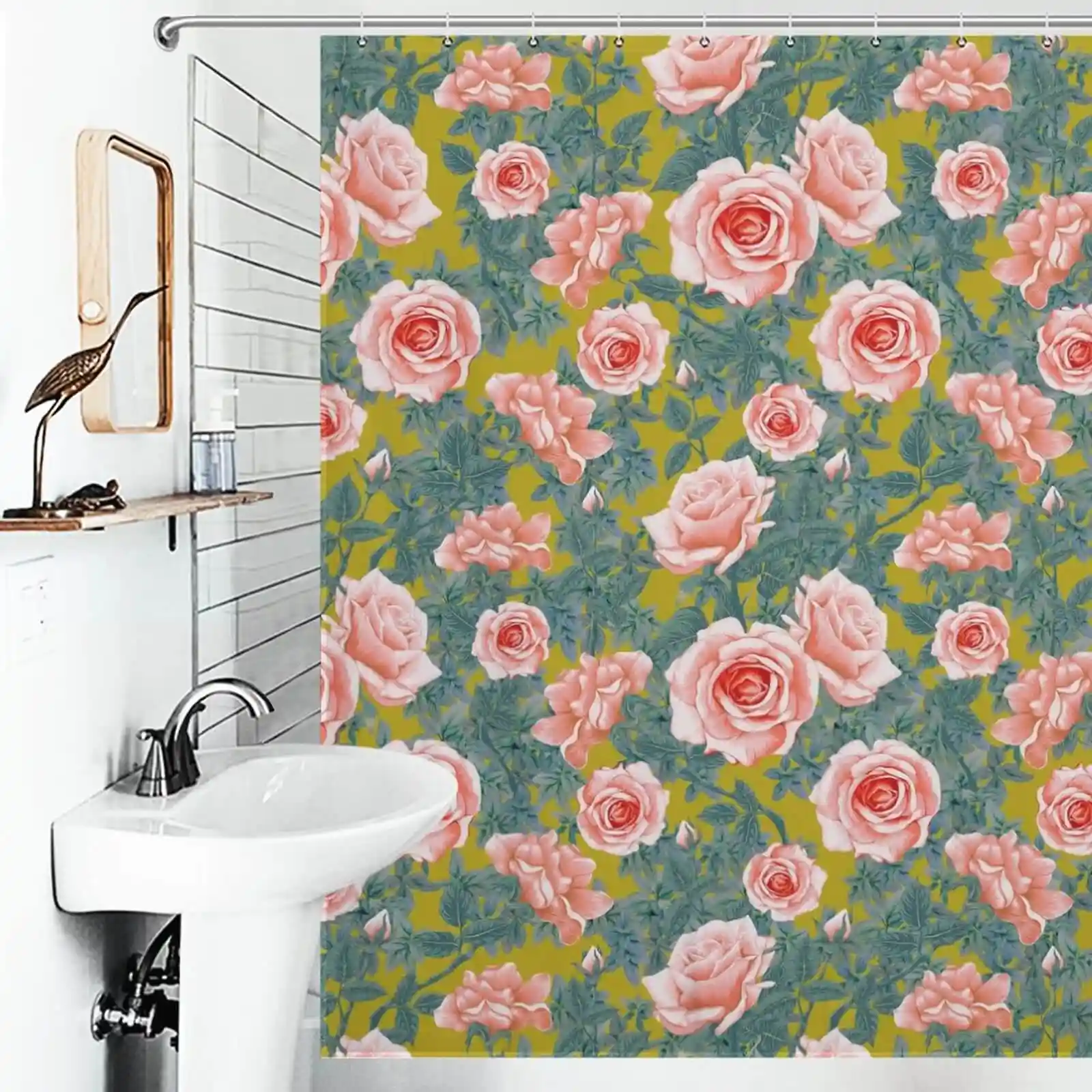 A shower curtain with pink roses and green leaves.